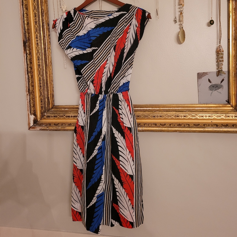 An adorable vintage homemade dress that i love
